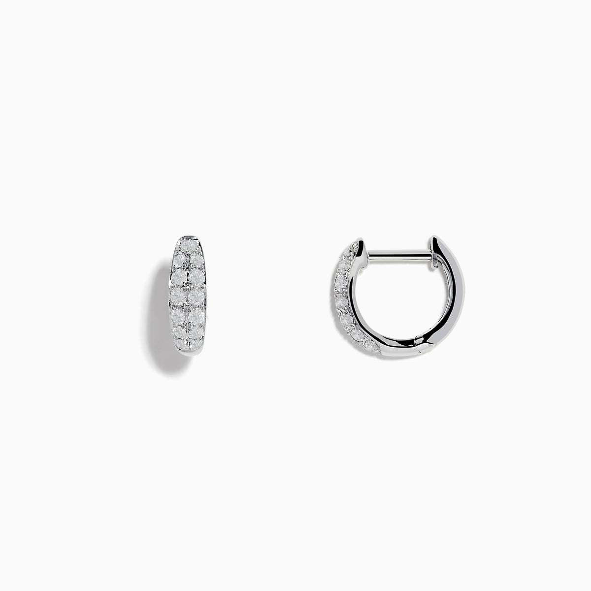 The Pave Classica 14k White Gold Diamond Huggie Earrings showcase elegant white gold design with sparkling diamonds, beautifully displayed against a plain white background.