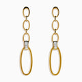 The D'Oro 14K Yellow Gold Diamond Dangle Earrings feature three oval links, a rectangular clear stone near the bottom, and a large open oval hoop, all displayed on a white background.