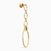 The D'Oro 14K Yellow Gold Diamond Dangle Earrings feature three oval links, a rectangular clear stone near the bottom, and a large open oval hoop, all displayed on a white background.
