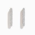The 14K Two-Tone Gold Diamond Pavé Rectangle Hoop Earrings feature vertical, elongated hoops encrusted with sparkling pavé-set white diamonds, showcased against a plain white background.