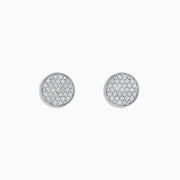 The 14K White Gold Diamond Disc Stud Earrings feature a pavé of sparkling white stones in a circular pattern, set in 14K white gold, shown against a plain white background.