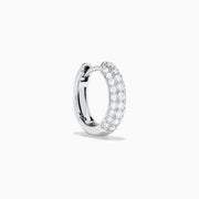 Introducing the 14K White Gold Diamond Three Row Pave Mini Hoop Earrings, featuring multiple rows of sparkling diamonds meticulously set in 14K white gold and elegantly presented against a plain white background.