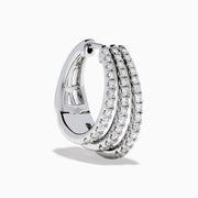 Elegant 14K White Gold Diamond Triple-Band Huggie Hoop Earrings featuring three overlapping curved rows of sparkling diamonds, set against a white background.