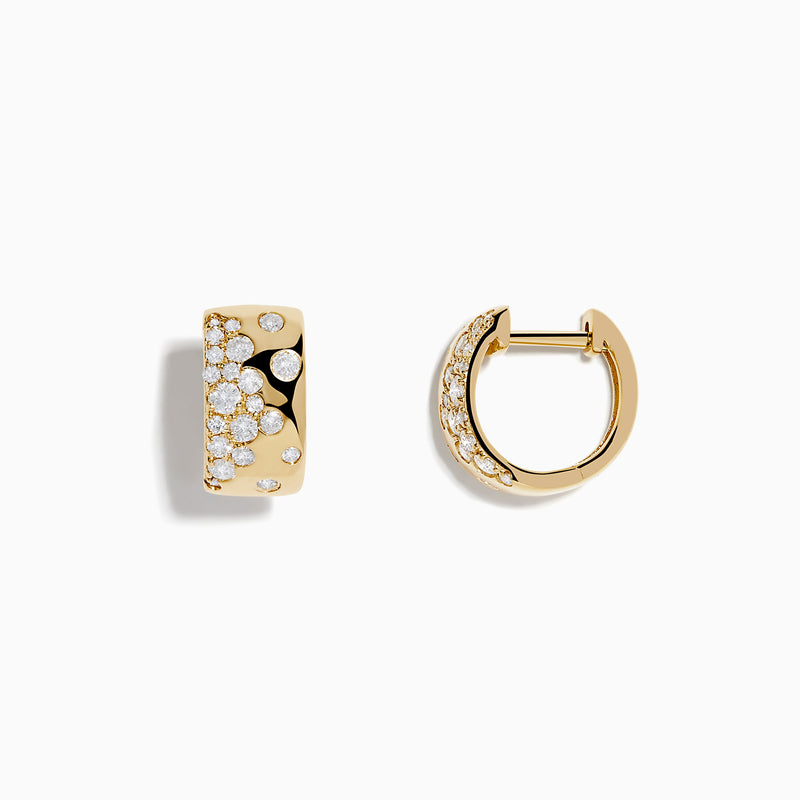 DOro 14K Yellow Gold Scattered Diamonds Earrings are small huggies featuring clusters of sparkling diamonds on the front surface, shown against a white background.