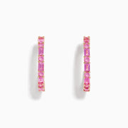 A pair of 14K Rose Gold Pink Sapphire Hoop Earrings with rectangular and round pink gemstones, displayed vertically on a plain white background.