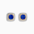 The Nahla Siri 14K White & Yellow Gold Tanzanite and Diamond Stud Earrings feature a large central blue tanzanite accented by rows of white and yellow diamonds, all set in luxurious white and yellow gold.