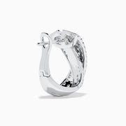 A pair of 14K white gold diamond pave crossover chunky hoop earrings, featuring an X-shaped design encrusted with multiple rows of sparkling diamonds, displayed on a plain white background.
