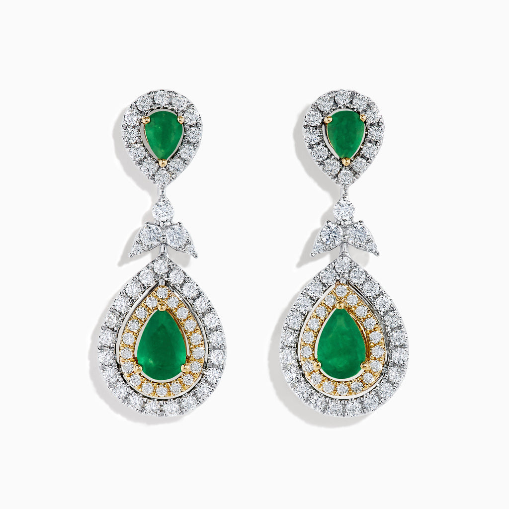 Chic 14K two tone gold statement earrings featuring double pear emeralds, concentric rows of white and yellow diamonds, and a delicate diamond bow—elegant emerald and diamond earrings for any occasion.
