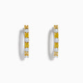 Canare 18K Two Tone White and Yellow Diamond Hoop Earrings, featuring alternating round yellow and white diamonds, are displayed against a white background.