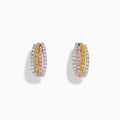 The 18K 3-Tone Gold White, Yellow and Pink Diamond Huggie Earrings feature three rows of diamonds set in white, yellow, and pink gold, showcased in a curved, oval-shaped design against a white background.