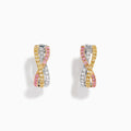 The 18K 3-Tone Gold White, Pink, and Yellow Diamond Huggie Earrings feature intertwined bands of diamonds in a crossover design, set against a white background.