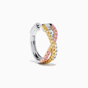 The 18K 3-Tone Gold White, Pink, and Yellow Diamond Huggie Earrings feature intertwined bands of diamonds in a crossover design, set against a white background.