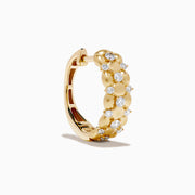 D'Oro 14K Yellow Gold Diamond Huggie Earrings feature a beaded design with clustered round white gemstones along the hoops, shown on a plain white background.