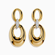 These 14K Yellow Gold Diamond Accented Double Drop Earrings feature oval and circular hoops linked by a marquise-shaped diamond cluster for a dazzling finish.