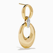 These 14K Yellow Gold Diamond Accented Double Drop Earrings feature oval and circular hoops linked by a marquise-shaped diamond cluster for a dazzling finish.