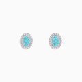 18K White Gold Paraiba and Diamond Stud Earrings featuring oval blue Paraiba center stones, each encircled by a halo of sparkling diamonds, set against a white background.