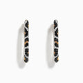 A pair of Signature 14K Yellow Gold Earrings adorned with black, espresso, and white diamonds for a striking look—an eye-catching Effy accessory.