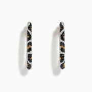 A pair of Signature 14K Yellow Gold Earrings adorned with black, espresso, and white diamonds for a striking look—an eye-catching Effy accessory.
