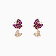The 14K Rose Gold Pink Sapphire and Diamond Butterfly Earrings feature a large butterfly accented with pink sapphires and a smaller one set with sparkling diamonds—an elegant addition to any rose gold jewelry collection.