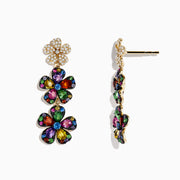 The Watercolors 14K Yellow Gold Multi Sapphire Flower Earrings feature three-tiered sapphire petals outlined in gold, attached to a gold flower stud adorned with sparkling clear crystals.