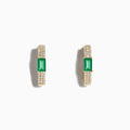 The Brasilica 14K Yellow Gold Emerald and Diamond Huggie Earrings feature rectangular green emeralds accented by rows of sparkling white diamonds, shown on a white background—an elegant, timeless accessory.