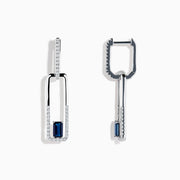 The Royale Bleu 14K White Gold Sapphire and Diamond Drop Earrings feature rectangular hoops adorned with diamonds and a central blue sapphire at the bottom of each elegant earring.