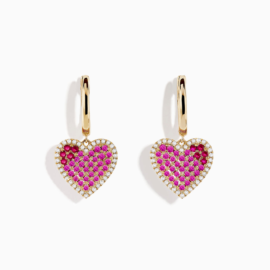 Novelty 14K yellow gold heart earrings with ruby, pink sapphire, and diamond accents are elegantly displayed on a white background.