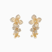 Doro 14 Karat Yellow Gold Diamond Flower Drop Earrings feature three gold floral designs with hammered petals and clusters of sparkling diamonds on each earring, arranged vertically for a striking look.