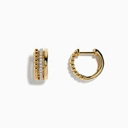 A pair of 14K Yellow Gold 1/2 Diamond Huggie Earrings (0.13 TCW) featuring textured gold beads and sparkling white stones, displayed against a plain white background.