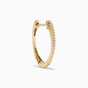 The DOro 14K Yellow Gold Diamond Hoop Earrings feature a subtle curve and sparkling diamonds along the front edge, beautifully showcased against a plain white background.