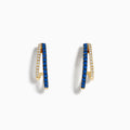 The Royal Bleu 14K Yellow Gold Sapphire and Diamond Double Hoop Earrings feature a zigzag design with sparkling sapphires and white stones, shown against a white background.