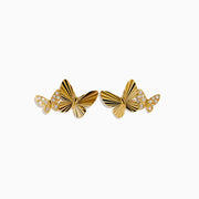 The 14K Yellow Gold Diamond Double Butterfly Stud Earrings feature a larger butterfly with ridged detailing and a smaller, gemstone-adorned butterfly, shown on a white background.