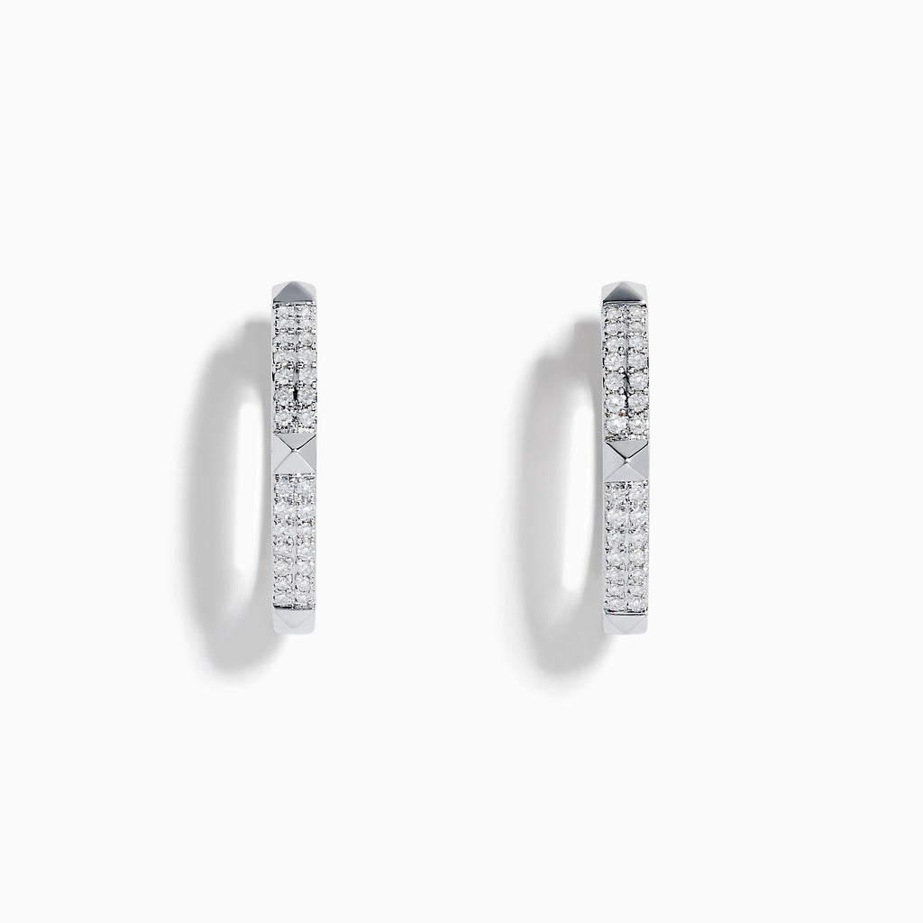 The Pave Classica 14K White Gold Diamond Hoop Earrings, adorned with small diamonds, are shown vertically against a plain white background with soft shadows.