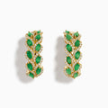 The 14K Yellow Gold Emerald and Diamond Marquise Leaf Hoop Earrings feature alternating marquise emeralds and diamonds in a graceful leaf-inspired design.