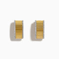 The D'Oro 14K Yellow Gold Diamond Hoop Earrings feature a ribbed texture with a border of small white diamonds, displayed against a white background.