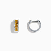 The Canare 14K Two Tone Gold Yellow and White Diamond Huggie Earrings showcase a central row of yellow diamonds bordered by two rows of white diamonds, all set in a striking two-tone gold design.