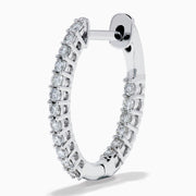 The 14K White Gold Pave Diamond Hoop Earrings 5/8" feature sparkling pave diamonds set in an elegant white gold hoop, displayed on a plain white background.