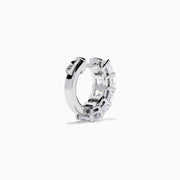 A pair of Lab Grown Emerald Cut Diamond Huggie Earrings in 14K white gold, each featuring three vertically-set rectangular clear stones, is displayed against a plain white background.