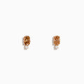 The 14K Rose Gold Brown and White Diamond Stud Earrings each feature an oval brown and white diamond above a small round gemstone, shown against a plain white background.