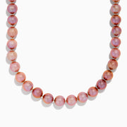 The 14K White Gold Lilac Fresh Water Pearl Necklace features round, shiny lilac pearls in a single strand with a 14K white gold clasp, displayed on a white background.