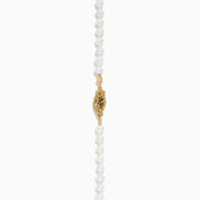 The 14K Yellow Gold Multi Color Freshwater Pearl Necklace features small white pearls graduating to larger pastel pink, peach, and lavender pearls at the center, all elegantly strung on 14K yellow gold.