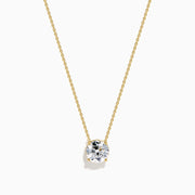 The Star Lab Grown Diamond Solitaire Pendant in 18K yellow gold features a fine chain with a single round lab diamond at the center.