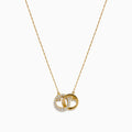 14K Yellow Gold Diamond Accented Interlocking Hearts Necklace featuring two entwined hearts—one with sparkling diamonds, the other polished smooth—shown on a plain white background.