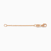 The 14K Rose Gold 1.2mm 2-Inch Cable Chain Extension features a small round link on one end and a lobster clasp on the other, shown against a white background.