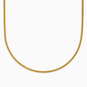 The Men's 14K Yellow Gold Hollow Franco Necklace features an intricate pattern and polished finish, forming a wide U-shape against a white background.