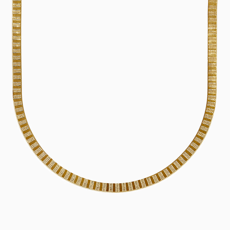 The 14K Yellow Gold Textured Herringbone Chain Necklace 17 features a flat, smooth, and wide U-shaped design displayed against a white background.