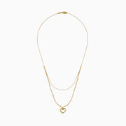 Two gold necklaces are shown: a delicate 14K yellow gold chain and the 14K Yellow Gold Stamp Heart Layered Paperclip Necklace, which features larger links and a heart-shaped pendant. Both pieces are displayed on a plain white background.