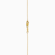 Two gold necklaces are shown: a delicate 14K yellow gold chain and the 14K Yellow Gold Stamp Heart Layered Paperclip Necklace, which features larger links and a heart-shaped pendant. Both pieces are displayed on a plain white background.