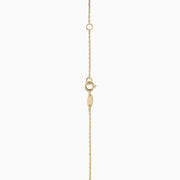 This 14 Karat Yellow Gold Polished Hollow Teardrop Pendant features a minimalist design on a forzantina chain, accented with black details on a plain white background.