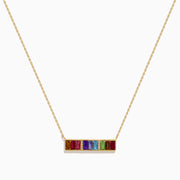 The Mosaic 14K Yellow Gold Multi Color Gemstone and Diamond Collar Bone Bar Necklace features a horizontal bar pendant set with five baguette-cut rainbow gemstones: red, purple, blue, green, and yellow.